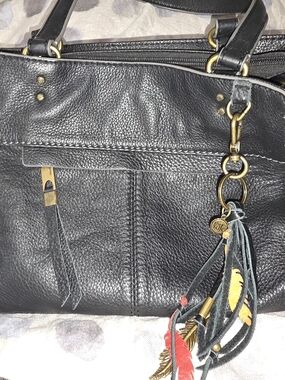 The Sak Black Leather Women’s Tote Bag with Feather Tassel